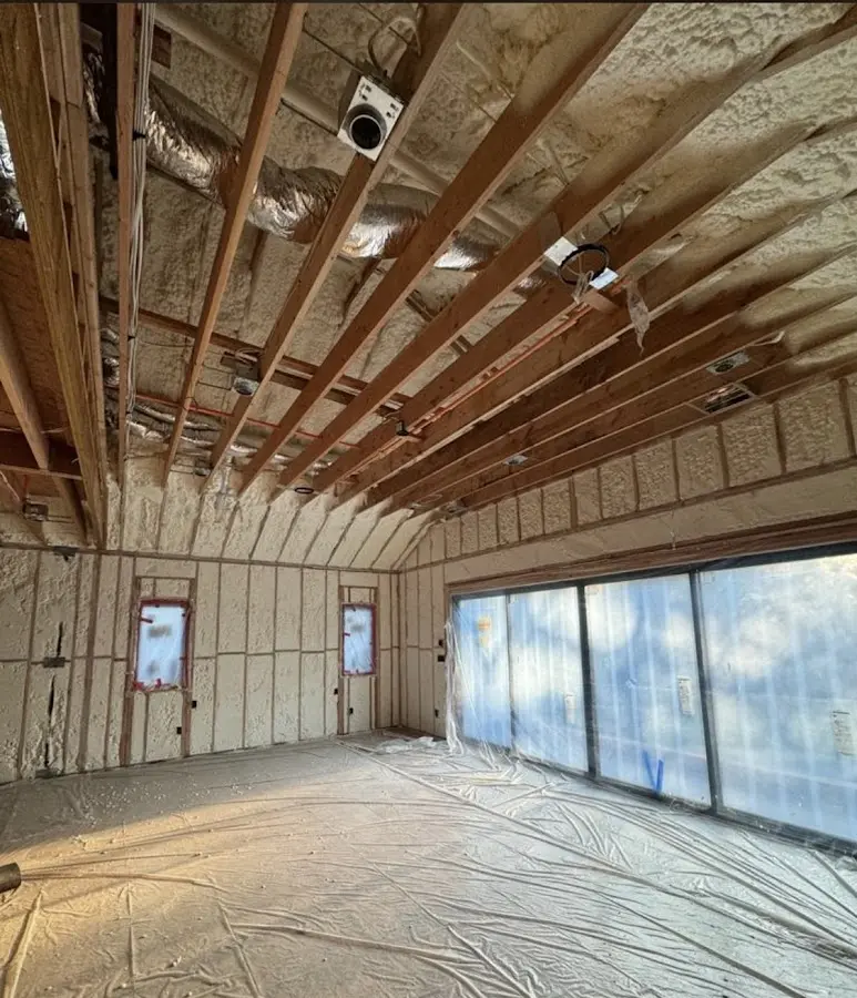 Interior walls and ceiling insulated with spray foam during new construction in Terre Haute